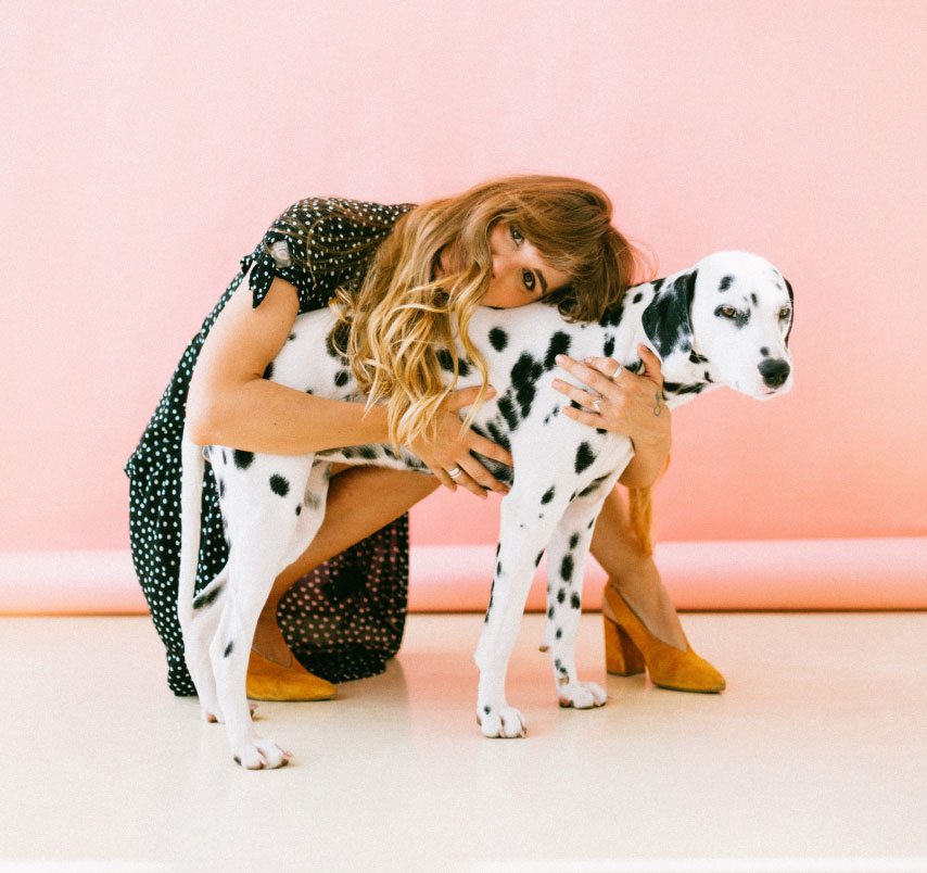 Woman Hugging a Dog Woman Hugging a Dog